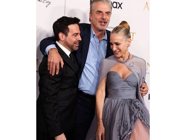 Mario Cantone, Chris Noth, and Sarah Jessica Parker pose while attending the red carpet premiere of the "Sex and The City" sequel, "And Just Like That" in New York City, Dec. 8, 2021.