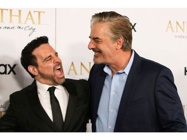 Chris Noth poses with Mario Cantone during the red carpet premiere of the "Sex and The City" sequel, "And Just Like That" in New York City, Dec. 8, 2021.