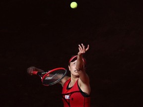 Tennis - WTA Mandatory - Madrid Open - Madrid, Spain - May 6, 2018   China's Peng Shuai in action against Spain's Garbine Muguruza during their round of 64 match