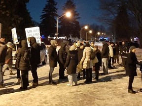 Hecklers gather outside Premier Doug Ford's Etobicoke home this week.