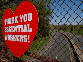 A heart-shaped sign reading "Thank you essential workers!" is pictured on an overpass amid the coronavirus disease (COVID-19) outbreak in Middletown, Connecticut, U.S., May 13, 2020.