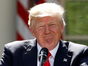 U.S. President Donald Trump pauses as he announces his decision that the United States will withdraw from the landmark Paris Climate Agreement, in the Rose Garden of the White House in Washington, U.S., June 1, 2017.