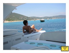 Ghislaine Maxwell kicks back on a yacht. COURT EXHIBIT/U.S. DEPT. OF JUSTICE
