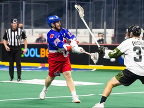 Toronto Rock forward Tom Schreiber makes a pass during his team's game against the Rochester Knighthawks at FirstOntario Centre in Hamilton on Jan. 29, 2022.