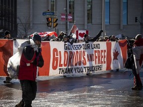 Protesters gathered around Parliament Hill and the downtown core for the Freedom Convoy protest that made their way from various locations across Canada, Jan. 30, 2022.