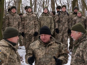 Civilian participants in a Kyiv Territorial Defence unit, including university students also enrolled in a military reserve program, train on a Saturday in a forest on Jan. 22, 2022 in Kyiv, Ukraine.