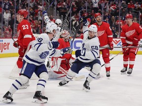 Michael Bunting of the Maple Leafs celebrates after scoring one of his three goals against the Red Wings at Little Caesars Arena on January 29, 2022 in Detroit.