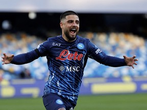 Napoli's Lorenzo Insigne celebrates scoring their fourth goal.