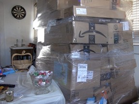 Stolen Amazon packages found by police in a Luther, Okla. home.