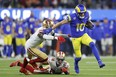 Cooper Kupp of the Los Angeles Rams runs after a catch in the fourth quarter against the San Francisco 49ers in the NFC Championship Game on Sunday at SoFi Stadium.