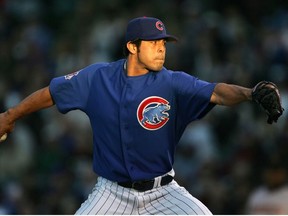 Sergio Mitre of the Chicago Cubs pitches against the Houston Astros on May 24, 2005 at Wrigley Field in Chicago, Illinois.