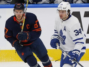 Oilers forward Connor McDavid (97) and Toronto Maple Leafs forward Auston Matthews are hopeful to play in Wednesday night's game.