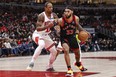 Toronto Raptors guard Gary Trent Jr. (33) drives to the basket against Chicago Bulls forward DeMar DeRozan (11) during the second half at United Center.