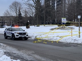 Peel Regional Police on Wednesday, Jan. 26, 2022 at the scene on Roche Court in Mississauga, the day after a fatal stabbing.