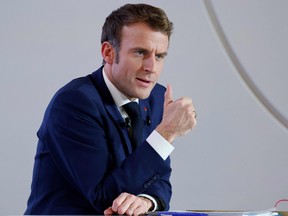 French President Emmanuel Macron delivers a speech during a press conference on France assuming EU presidency, in Paris, December 9, 2021.