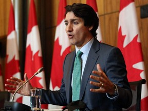 Prime Minister Justin Trudeau speaks during a press conference on the COVID-19 situation, in Ottawa, Jan. 5, 2022.