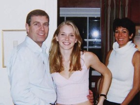 An undated handout photo taken at an undisclosed location and released on Aug. 9, 2021 by the United States District Couty for the Southern District of New York shows (left to right) Prince Andrew, Virginia Giuffre, and Ghislaine Maxwell posing for a photo.