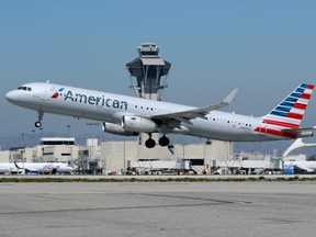 An American Airlines Airbus A321-200 plane takes off from Los Angeles International airport in Los Angeles, March 28, 2018.