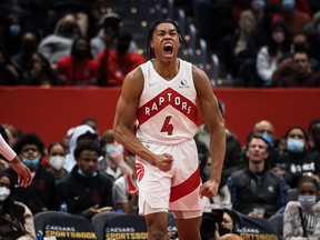 Scottie Barnes #4 of the Toronto Raptors celebrates after a play against the Washington Wizards during the second half at Capital One Arena on January 21, 2022 in Washington, DC.