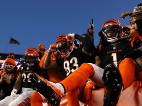 Bengals Wide receiver Tyler Boyd, centre, celebrates a controversial late first half touchdown against the Raiders on Saturday. Getty Images