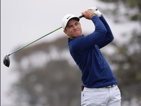 Cameron Champ plays his shot from the fifth tee during the final round of the Farmers Insurance Open golf tournament at Torrey Pines Golf Course in San Diego, Calif., Jan. 26, 2020.