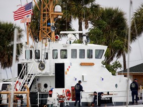 Members of the crew are seen onboard the U.S. Coast Guard Cutter Skipjack docked at the U.S. Coast Guard station, in Fort Pierce, Florida on January 26, 2022.