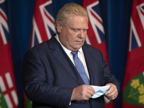 Ontario Premier Doug Ford attends a news conference in Toronto on Monday, January 3, 2022.