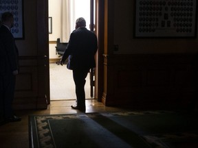 Ontario Premier Doug Ford returns to his office following  a news conference in Toronto on Monday January 3, 2022.