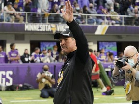 Minnesota Vikings head coach Mike Zimmer walks off the field after an NFL football game against the Chicago Bears, Sunday, Jan. 9, 2022, in Minneapolis. The Vikings won 31-17.