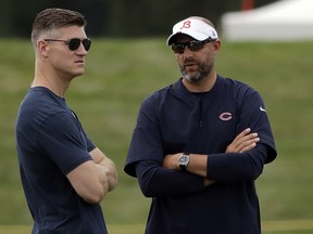 Chicago Bears head coach Matt Nagy, right, talks with general manager Ryan Pace during NFL football training camp in Bourbonnais, Ill. on July 26, 2019.