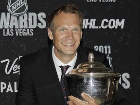 Detroit Red Wings' Nicklas Lidstrom is photographed with the James Norris Memorial Trophy at the 2011 NHL Awards, Wednesday, June 22, 2011, in Las Vegas.