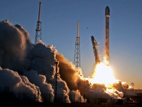 In this Feb. 11, 2015 file photo, a Falcon 9 SpaceX rocket lifts off from launch complex 40 at the Cape Canaveral Air Force Station in Cape Canaveral, Fla.