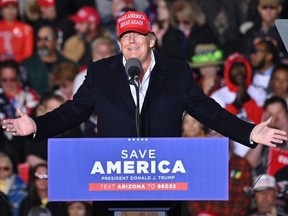 Former U.S. President Donald Trump speaks during a rally at the Canyon Moon Ranch festival grounds in Florence, Ariz., Jan. 15, 2022.