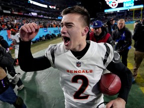 Cincinnati Bengals kicker Evan McPherson celebrates after kicking the game-winning 52-yard field goal to defeat the Tennessee Titans 19-16 during the AFC Divisional playoff football game at Nissan Stadium in Nashville, Tenn., Jan. 22, 2022.