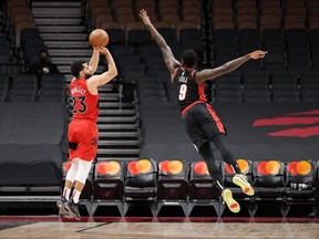 Raptors' Fred VanVleet shoots over Nassir Little of the Portland Trail Blazers during an NBA game at Scotiabank Arena on Jan. 23, 2022.