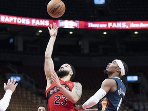 Toronto Raptors guard Fred VanVleet (left) drives past the New Orleans Pelicans in a game at Scotiabank Arena. -