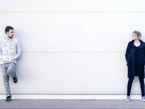 Young man and woman looking at each other