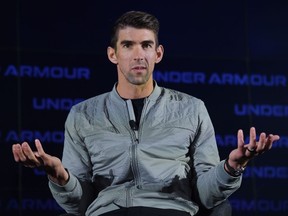 Former record-winning US Olympian swimmer Michael Phelps speaks at the 2020 Under Armour Human Performance Summit on January 14, 2020 in Baltimore, Maryland. (Photo by OLIVIER DOULIERY/AFP via Getty Images)