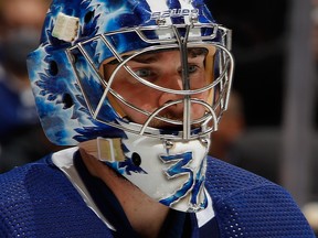 Jack Campbell of the Maple Leafs keeps his eyes on the puck during NHL action at Scotiabank Arena in Toronto, Nov. 12, 2021.