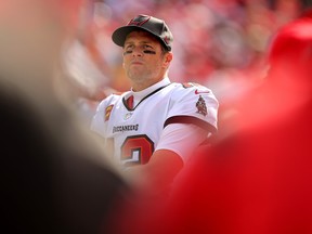 Tom Brady of the Tampa Bay Buccaneers looks on against the Philadelphia Eagles in the first half of the NFC wild card playoff game at Raymond James Stadium on January 16, 2022 in Tampa, Florida.