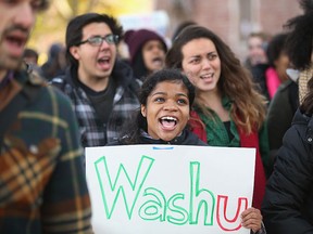 Students at Washington University protest to draw attention to police abuse on December 1, 2014 in St. Louis, Missouri.(Photo by Scott Olson/Getty Images)
