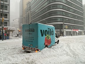 Snowmageddon: Gardiner, Dvp Shut Down As Gta Under Blizzard Warning A Vehicle Is Stuck In Snow At The Corner Of Wellington St And Blue Jays Way During Toronto'S Epic Snowfall On Monday, January 17, 2022.