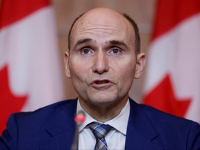 Federal Minister of Health Jean-Yves Duclos takes part in a news conference, as the latest Omicron variant emerges as a threat amid the COVID-19 pandemic, in Ottawa,  Jan. 5, 2022.