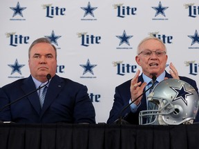 Mike McCarthy of the Dallas Cowboys and team owner Jerry Jones talk with the media during a press conference at the Ford Center at The Star on January 8, 2020 in Frisco, Texas.