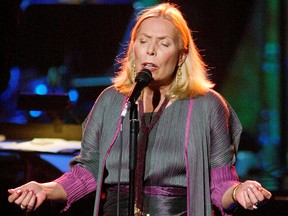 Singer Joni Mitchell performs during the "Stormy Weather" concert in Los Angeles November 14, 2002.