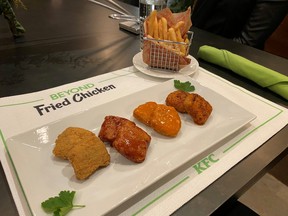 A plate of Beyond Fried Chicken served with KFC sauces is seen in Chicago, Jan. 28, 2020.