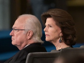 Sweden's King Carl XVI Gustaf and Queen Silvia attend a ceremony to pay tribute to the 2021 Nobel Prize laureates at the Stockholm City Hall in Stockholm, Sweden on December 10, 2021.