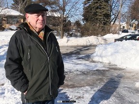 Scarborough resident Raymond Knight stands in front of his driveway on Thursday, Jan. 20. The snow on the driveway that had him stuck at home has since been cleared.