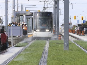 A Metrolinx Eglinton Crosstown Light Rapid Transit train is rolled out on Aug. 27, 2001 along a stretch of Eglinton Ave. E. through the 'Golden Mile' section of Scarborough from Victoria Park.