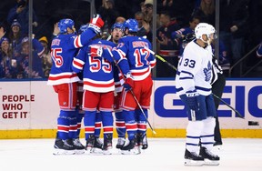 The Rangers celebrate a first-period goal by Ryan Reaves against the Toronto Maple Leafs at Madison Square Garden on Wednesday, Jan. 19, 2022 in New York.